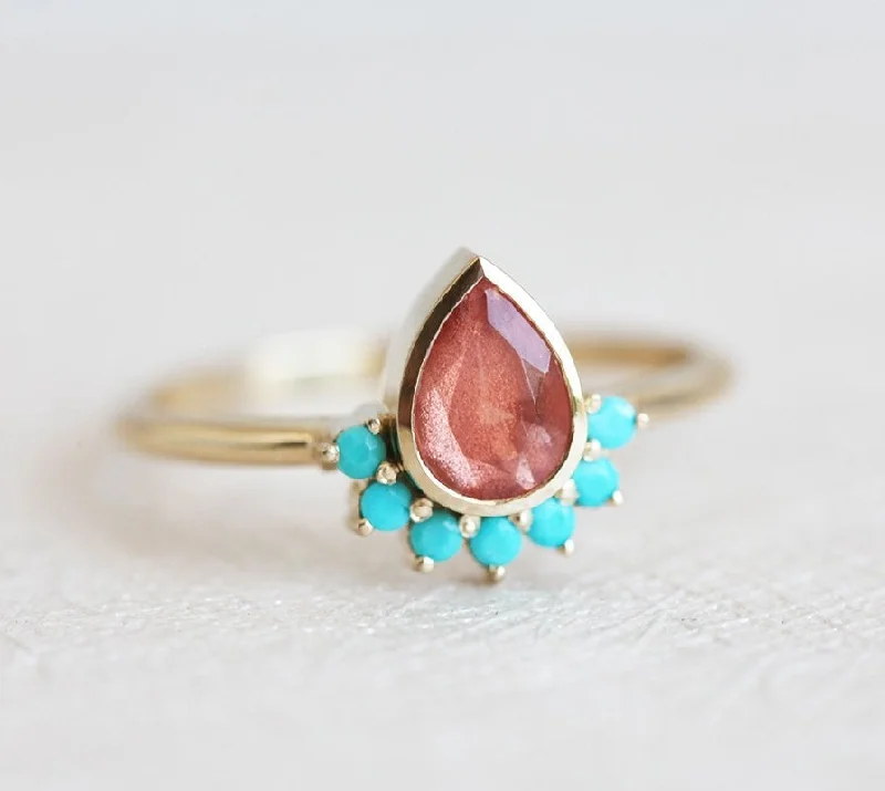 Trending Jewelry Styles Now At Limited-Time Discounts Bohemian Oregon Sunstone Ring With Turquoise Accents Trending Jewelry Styles Now At Limited-Time Discounts Bohemian Oregon Sunstone Ring With Turquoise Accents